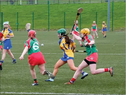  ??  ?? Wicklow’s Lucy Rooney in action against Mayo’s Aoife Doherty and Geri Maye Henry during the All-Ireland Minor clash in Bray Emmets GAA Club recently.