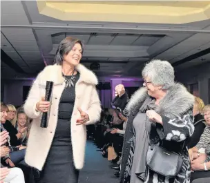  ??  ?? ●● Sue Heaven, left, and Sarah Linford from Rossendale Trust, at last year’s fashion show
