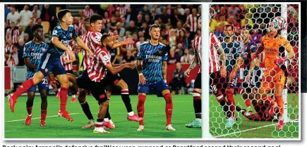  ?? REX ?? Back pain: Arsenal’s defensive frailties were exposed as Brentford scored their second goal