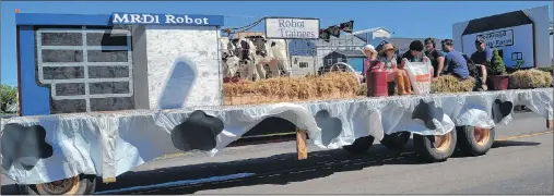  ?? ERIC MCCARTHY/JOURNAL PIONEER ?? The Dock Road Family Farm brought along part of its herd and rode off with two major awards from the Prince County Exhibition Parade in Alberton, best agricultur­al entry and best overall.