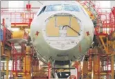  ?? REUTERS ?? An employee works at the A320 family final assembly line of the Airbus factory in Tianjin.