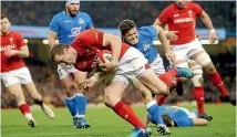  ?? PHOTO: AP ?? Hadleigh Parkes about to score for Wales against Italy in Cardiff.