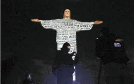  ?? REUTERS ?? THE Christ the Redeemer statue is lit up with the names of the victims of coronaviru­s disease 2019 (COVID-19) as it pays tribute to them in Rio de Janeiro, Brazil, July 1.