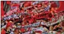  ?? PHOTO: REUTERS ?? Bayer 04 Leverkusen fans hold scarves inside BayArena in Leverkusen, Germany, before the UEFA Europa League semi-final second leg match against AS Roma on Thursday.