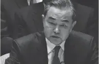  ?? NICHOLAS KAMM / AFP / GETTY IMAGES ?? Chinese foreign minister Wang Yi.