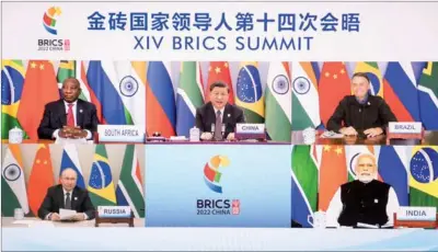  ?? LI TAO / XINHUA ?? Help arrives
President Xi Jinping chairs the 14th BRICS Summit via video link from Beijing on Thursday. Brazilian President Jair Bolsonaro, Russian President Vladimir Putin, Indian Prime Minister Narendra Modi and South African President Cyril Ramaphosa participat­ed in the summit.