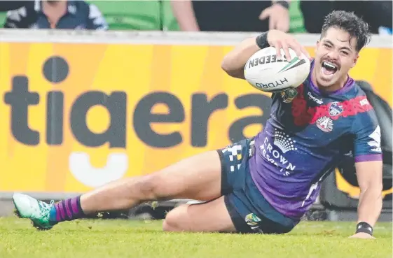  ?? Picture: GETTY IMAGES ?? Young Tonumaipea scores a try in the NRL during his time at Melbourne Storm, Australia.