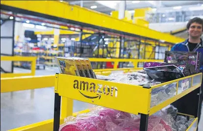  ?? Picture / Bloomberg ?? Amazon is setting up a 24,000sq m fulfilment centre in Melbourne.