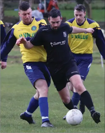  ??  ?? Glencormac’s Luke O’Callaghan challenges Newtown United’s Seán Heffernan.