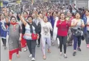  ?? PTI ?? GJM activists raise slogans at a rally in Darjeeling on Sunday.