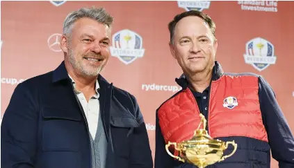  ?? Picture: USA TODAY Sports ?? PHOTO CALL. Europe team captain Darren Clarke and Team US captain Davis Love III pose for pictures after the captains’ press conference on Monday ahead of the 41st Ryder Cup.