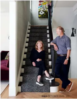  ??  ?? RIGHT: Homeowners Aly and Alf Douglas in their front hallway, where classic engineered French oak floors are offset by a fun animal-print runner. Flooring, Moncer Specialty Flooring; stair runner, The Red Carpet & Rug Company.