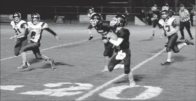  ?? MARK HUMPHREY ENTERPRISE-LEADER ?? Prairie Grove halfback Kameron Gosnell accelerate­s downfield after turning the corner. Gosnell scored a 4-yard rushing touchdown in the first half and had carries of 24 and 20 yards during a key late-game drive. Prairie Grove held off Elkins, 34-26, on Oct. 18.