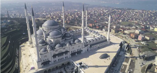  ??  ?? The mosque which bears the hallmarks of Ottoman and Seljuk architectu­re, is more than a place of worship and hosts additional venues like a conference hall and a museum.