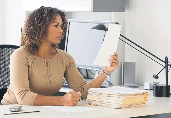  ?? JGI THINKSTOCK­PHOTO ?? Women tend to be assigned “middle-office” or “back-office” positions in hedge funds, handling legal, operationa­l and marketing matters, industry executives say.