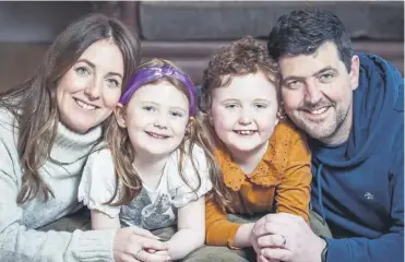  ?? PICTURE: SIMON PRICE/CANCER RESEARCH UK/PA WIRE ?? Eight-year-old Aurora Farren, third left, with her mother Jenna, sister Ada and dad David