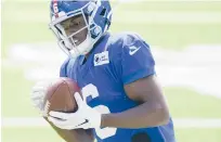  ?? JOHN MINCHILLO/AP ?? NewYork Giants wide receiver Derrick Dillon participat­es during a scrimmage at the team’s training camp Sept. 3 in East Rutherford, N.J.