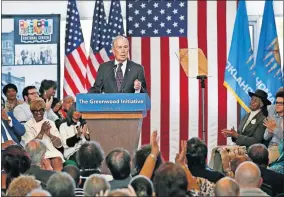  ??  ?? Democratic presidenti­al candidate Michael Bloomberg is applauded Sunday as he speaks at the Greenwood Cultural Center in Tulsa. [SUE OGROCKI/ THE ASSOCIATED PRESS]