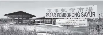  ??  ?? The new wholesale market at Penampang Bypass will be operationa­l on April 1.