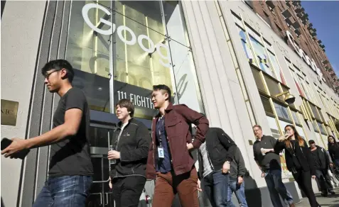  ??  ?? Google employees walk off the job in a protest against what they said is the tech company’s mishandlin­g of sexual misconduct allegation­s against executives on Thursday, Nov. 1, 2018, in New York. (AP)