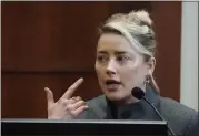  ?? AP ?? Actor Amber Heard testifies in the courtroom at the Fairfax County Circuit Courthouse in Fairfax, Va., Monday.