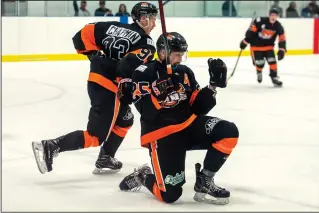  ?? NEWS PHOTO RYAN MCCRACKEN ?? Medicine Hat Cubs forward Mason Fischer celebrates with teammate Spencer Chapman after scoring the overtime winner against the Cochrane Generals in a Heritage Junior Hockey League game on Sunday, Dec. 22, 2019 at the Kinplex. Fischer was named the team’s MVP via Twitter Sunday.