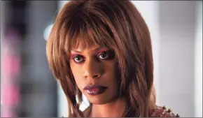  ?? Tobin Yellan / Associated Press ?? Laverne Cox in a scene from “Bad Hair,” a comedy-horror about woman trying to rise in the late-80s music business who gets a demonic weave.