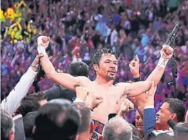  ?? (AP) ?? Campeón welter de la AMB. El filipino Pacquiao y otro título.