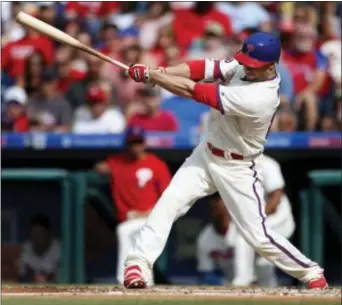  ?? THE ASSOCIATED PRESS ?? Phillies’ Daniel Nava follows through on a single in the fourth inning.