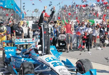  ?? Chuck Bennett Associated Press ?? SIMON PAGENAUD celebrates after winning the 2016 Toyota Grand Prix of Long Beach. Pagenaud overtook Scott Dixon for the win.