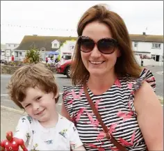  ??  ?? Fionn and Sandra Burke from Wexford enjoying last year’s Kilmore Quay Seafood Festival.