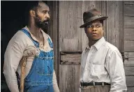  ?? STEVE DIETL / NETFLIX ?? Rob Morgan, left, with Jason Mitchell, shows remarkable restraint in Mudbound.