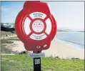  ?? ?? One of four new life ring stations at Half Moon Bay beaches. Each contains a ring buoy and 100 feet of rope that can be thrown out to a person in danger.