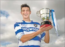  ?? Photo: Neil Paterson ?? Newtonmore captain Stuart Mitchell with the Sutherland Cup.