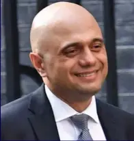  ??  ?? Tired smile: Home Secretary Sajid Javid