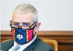  ??  ?? Speaker Philip Gunn, R-clinton, wearing a new, voter selected Mississipp­i state flag face mask. (Photo by Rogelio V. Solis, AP)