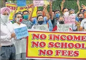  ?? AFP ?? Parents shout slogans against the HC judgement on collection of fee by private schools in Amritsar on Wednesday.