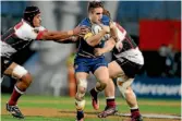  ?? PHOTO: GETTY IMAGES ?? Otago’s Fletcher Smith looks for a pass during the championsh­ip final against North Harbour.