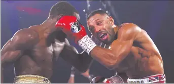  ?? Photo: East Side Boxing. ?? Heavy blows… Kell Brook (right) was knocked down by Terence Crawford (left) inside four rounds of their WBO welterweig­ht title fight in Las Vegas on Saturday night.