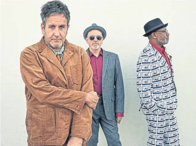  ?? The specials ?? El cantante, Terry Hall; el bajista, Horace Panter, y el guitarrist­a, Lynval golding, resignific­an su propio legado