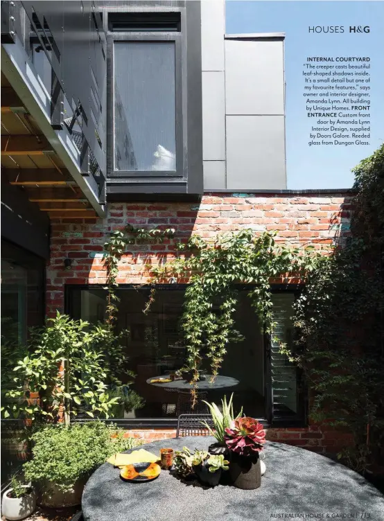  ??  ?? 113 INTERNAL COURTYARD “The creeper casts beautiful leaf-shaped shadows inside. It’s a small detail but one of my favourite features,” says owner and interior designer, Amanda Lynn. All building by Unique Homes. FRONT
ENTRANCE Custom front door by Amanda Lynn Interior Design, supplied by Doors Galore. Reeded glass from Dungan Glass.