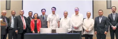  ??  ?? DEPARTMENT OF ENERGY (DoE) Secretary Alfonso G. Cusi signed a Memorandum of Agreement (MoA) with the UP Statistica­l Center Research Foundation, Inc. (UPSCRFI) on the implementa­tion of the Philippine Downstream Natural Gas Regulation (PDNGR).