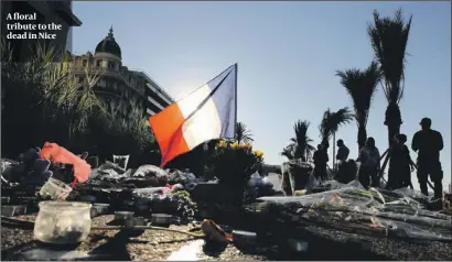  ?? PHOTO: AP ?? A floral tribute to the dead in Nice