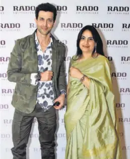  ??  ?? Rado’s brand ambassador, Hrithik Roshan, along with Simran Chandhoke, brand manager, Rado