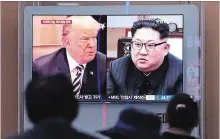 ?? CHUNG SUNG-JUN GETTY IMAGES ?? People watch a TV report in Seoul on Thursday. U.S. President Donald Trump has cancelled a summit with North Korea’s Kim Jong Un.