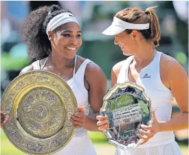  ??  ?? Williams and Muguruza share a word after the final.