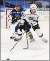  ??  ?? St Louis Blues’ Justin Faulk (72) defends against Los Angeles Kings’ Gabriel Vilardi (13) during the third period of an NHL hockey game, on Jan 24, in St Louis. (AP)