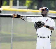  ?? Democrat-Gazette file photo ?? D’Vone McClure, shown during an American Legion tournament in 2012, spent four seasons playing baseball in the Cleveland Indians organizati­on before returning to Arkansas to play football.