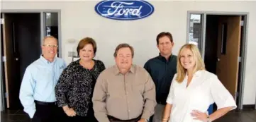  ?? FILE PHOTO ?? Smith Ford in Conway is a fifth-generation business. Family members Kenne Ketcheside, from the left, Cathy Ketcheside, Ted Smith, Sam Ketcheside and Cate Ketcheside continue a long tradition of customer service.