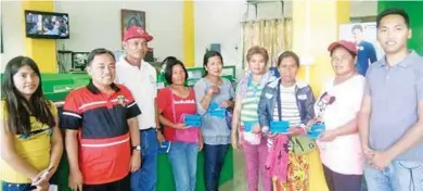  ??  ?? Through the collaborat­ion of Nestlé Philippine­s and Department of Agricultur­e-Agricultur­al Credit Policy Council (DA-ACPC), some 45 coffee farmers from the municipali­ties of Maramag, Pangantuca­n and Lantapan in Bukidnon, have availed of financial assistance through the Production Loan Easy Access (PLEA) program being implemente­d by the DA-ACPC.